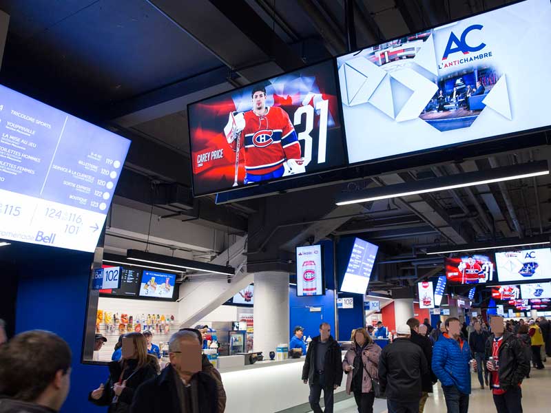 stadium_bell-center-montreal-corridor-multi-diaplays-wayfinding-powered-by-navori-ql-software